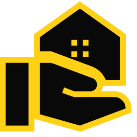 Hand holding a house icon, symbolizing real estate services and home ownership assistance.